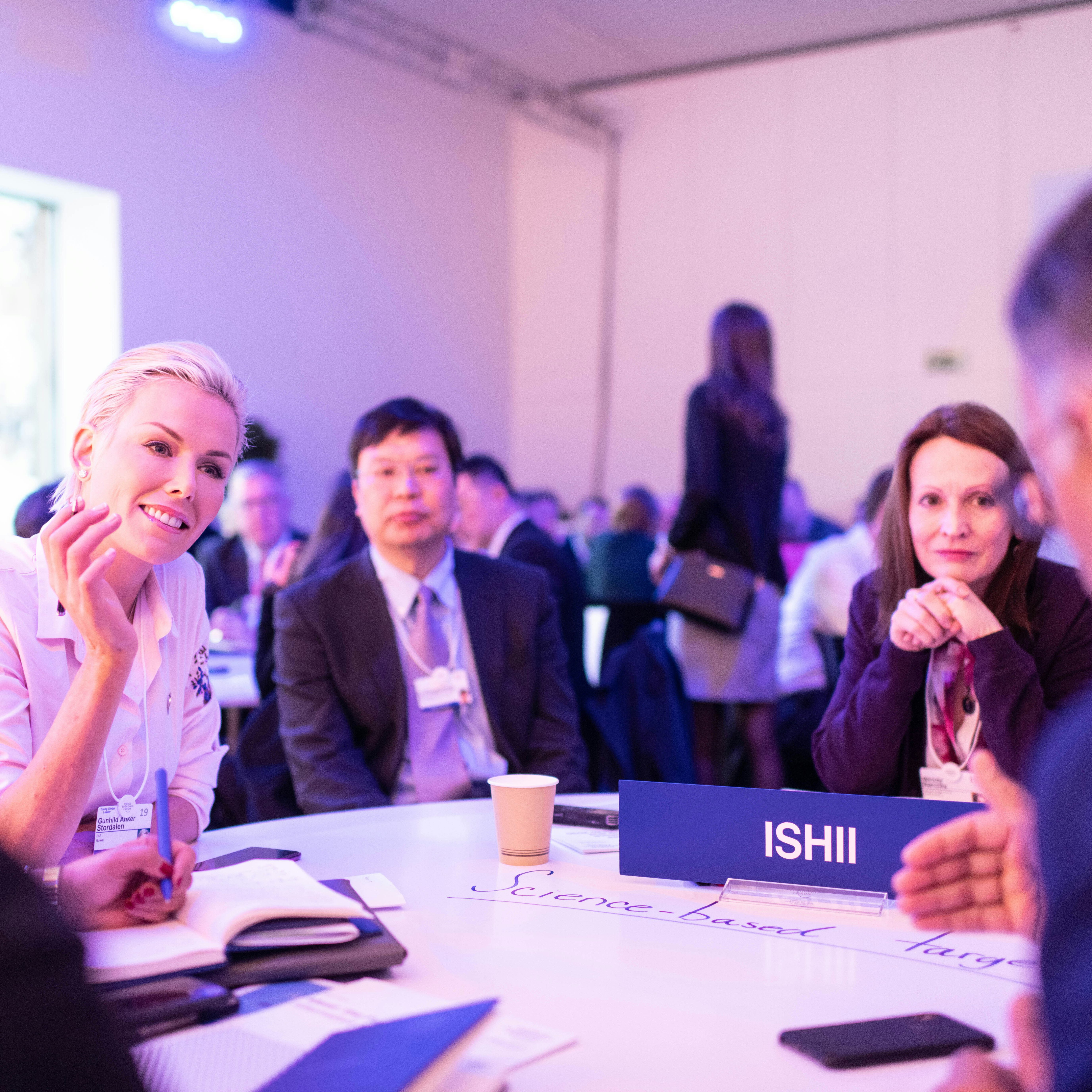 Exhibitors networking at a event with Event.